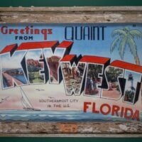 “Greetings from Quaint Key West, Florida” 1940s Linen Postcard Print in Barnacle Lobster Trap Wood Frame